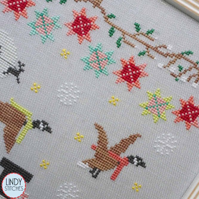 Snowflakes and Stars Cross Stitch Pattern by Lindy Stitches