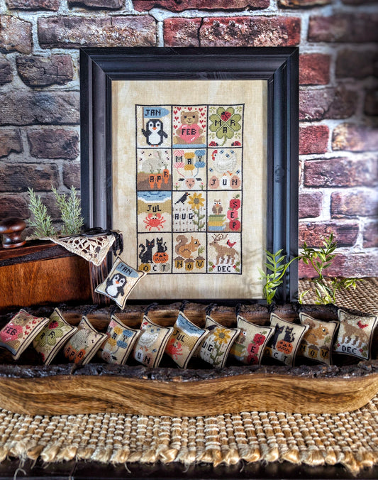Months 2025 cross stitch pattern by Puntini Puntini Nashville Market